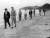 All Blacks training: trainers W.J. Wallace & J.T. Burrows lead the parade along the beach