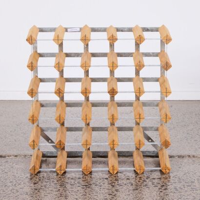 A Small Wooden Industrial Wine Rack