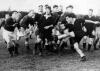 Dr. M.N. Paewai (New Zealand Māori half-back) kicks for touch. D.C. Furness [Aust. NSW - hooker] is in the line of fire