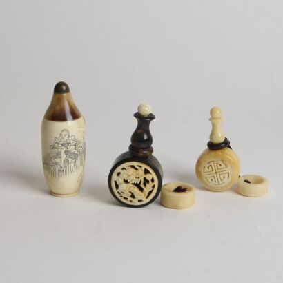 A Group of Three Chinese Carved Horn Snuff Bottles