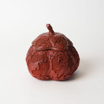 A Chinese Red Lacquer Carved Jar with Cover