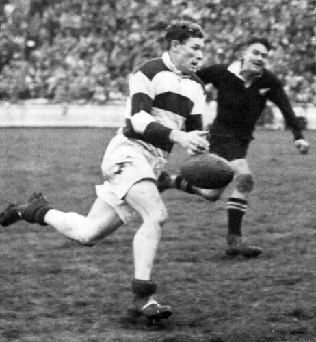 John Wallace 'Jack' Kelly (Auckland right wing) about to catch the ball in full stride with William Huia 'Bill' Taylor (New Zealand M?ori centre)