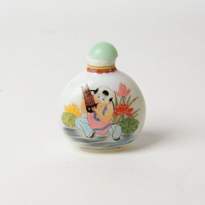 A Chinese Overlay &lsquo;Baby&rsquo; Glass Snuff Bottle
