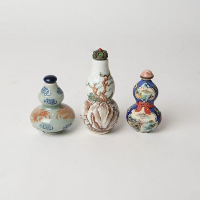 A Group of Three Chinese Porcelain Snuff Bottles