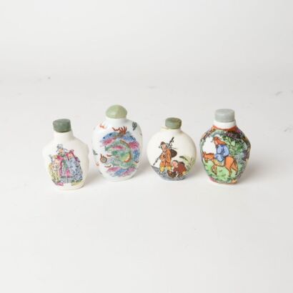 A Group of Four Chinese Famille-rose &lsquo;Dragon and Figure&rsquo; Porcelain Snuff Bottles