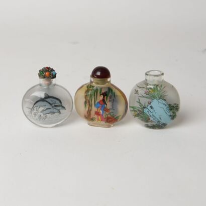 A Group of Three Chinese Inside-painted &lsquo;Figure, Dolphin, and Floral&rsquo; Glass Snuff Bottles