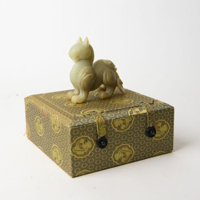 A Chinese Han dynasty style jade carved mythical beast ornament