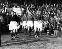 Teams are led out onto Athletic Park by Wellington captain Jack Lester Griffiths (Poneke Club) and Gerhardt Hamilton 'Gerry' Brand (South Africa)