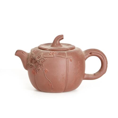 A Chinese Red Clay Melon-shaped 'Prunus' Teapot