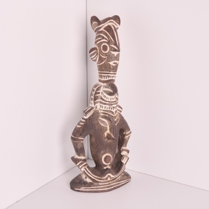 A Wood Carved Figure with Kaolin Detailing, Papua New Guinea