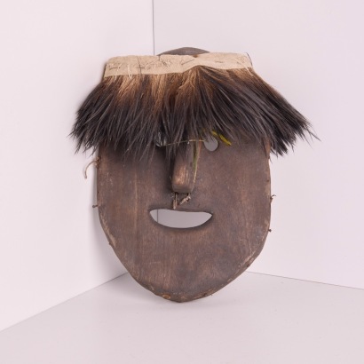 A Wood Carved Mask with Cassowary Feathers, Papua New Guinea