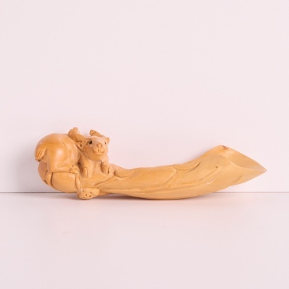A Wood Netsuke of a Deer on a Scoop, Japan