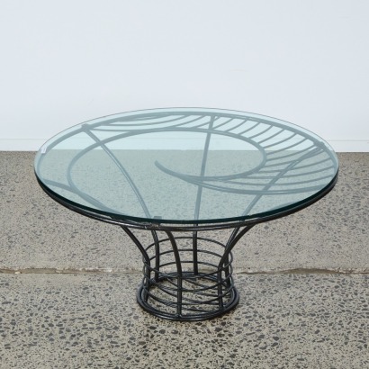 A Wrought Iron and Glass Coffee Table