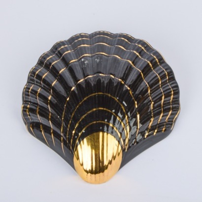 A Shell-Shaped Wall Vase With Gold Trim