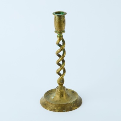 An Antique Brass Open Barley Twist Candlestick