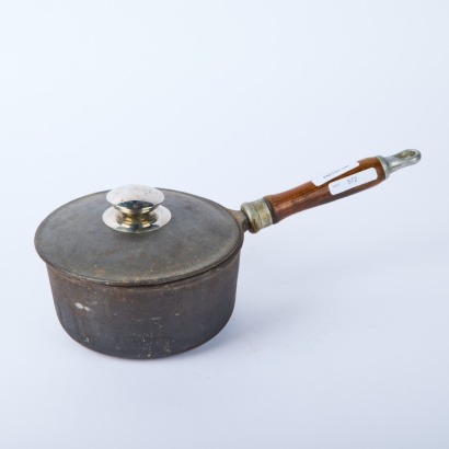 A Cast Iron Pot with Wood Handle