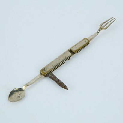 A Miniature Folding Cutlery Set