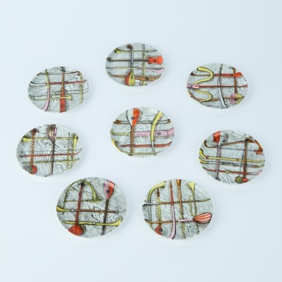 A Boxed Set of Eight Fornasetti Orchestra Ceramic Coasters