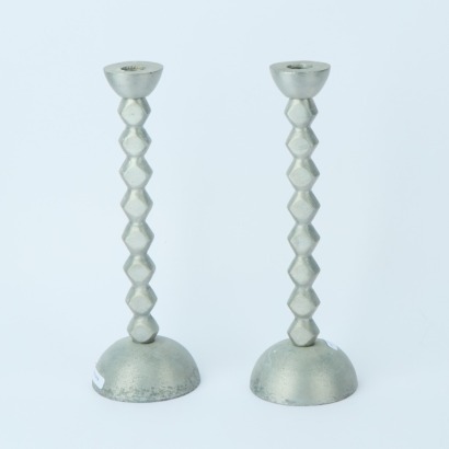 A Pair of Aluminium Candlesticks