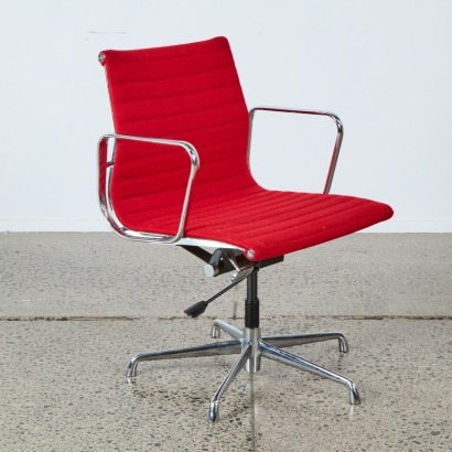 A Red Eames Group Style Chair