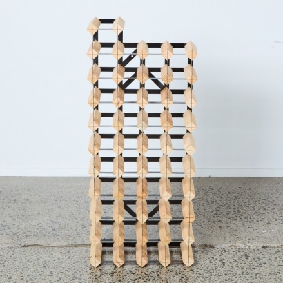 A Wooden Wine Rack with Black Metal Fixtures for 37 Bottles