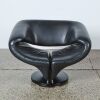 A Moroso Style Swivel Armchair in Black