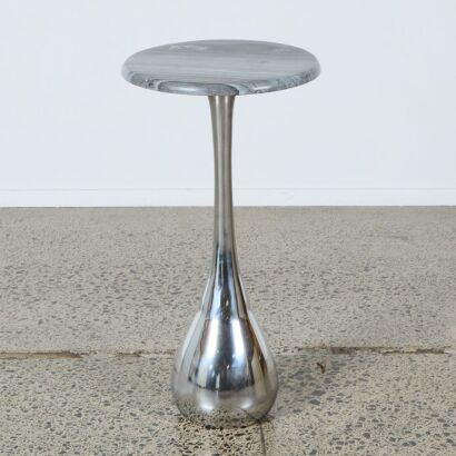 A Polished Granite Side Table