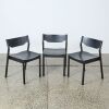 A Set of Three Tangerine Chairs