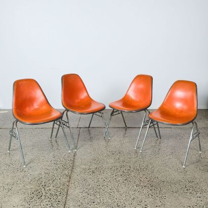 A Set of Four DSS Stacking Chairs Charles & Ray Eames