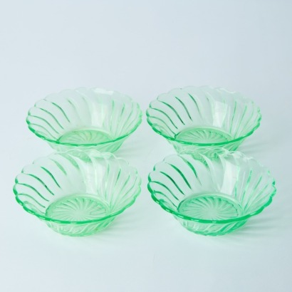 A Set Of Four Uranium Glass Bowls