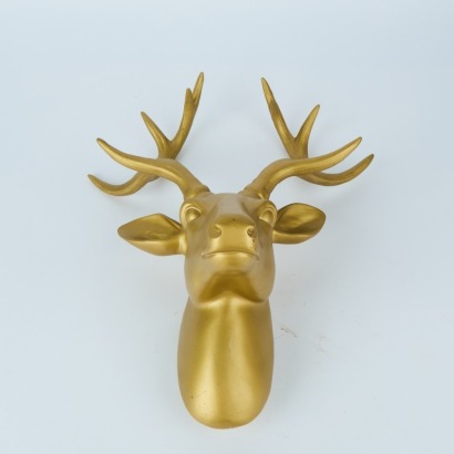 A Gold Deer Head Wall Hanging