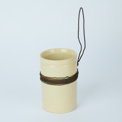 A Vintage Ceramic Kitchen Utensil Holder with Twisted Wire Wall Loop