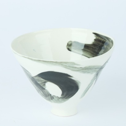 A Hand Thrown Pottery Bowl with Black Glaze Swoops