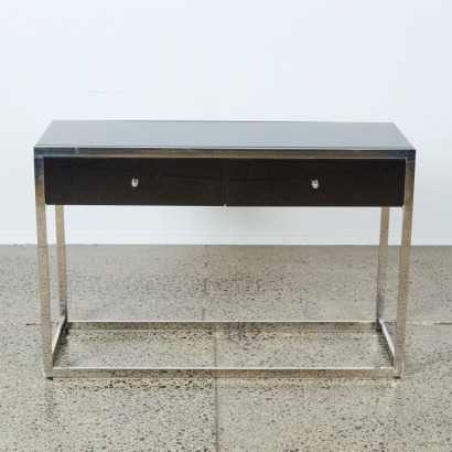 A Blackened Glass and Chrome Console Table
