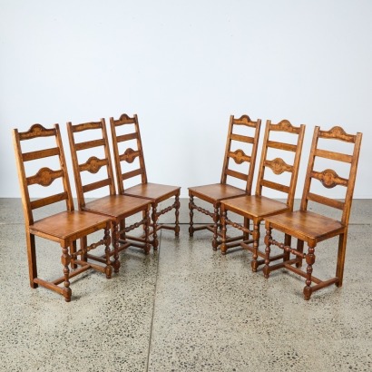 A Suit of Six French Oak Chairs