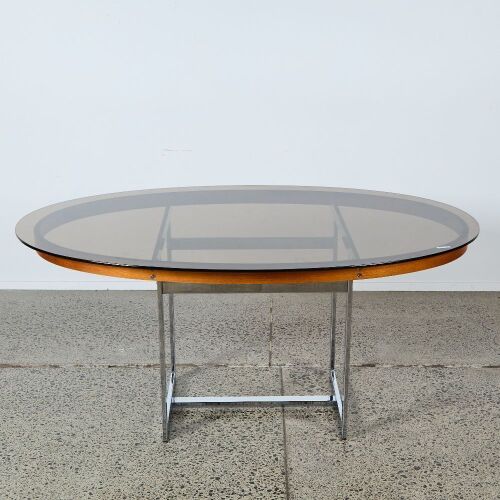 A Merrow & Associates Rosewood Oval Table