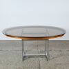 A Merrow & Associates Rosewood Oval Table