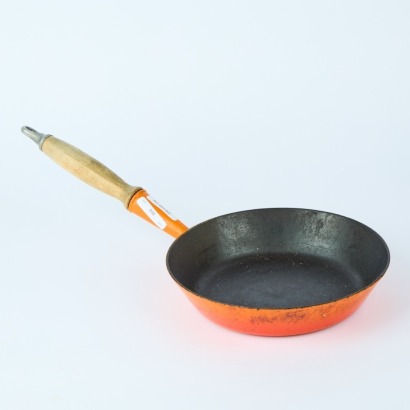 An Orange Cast Iron Pan