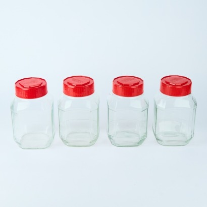 A Set of Four Vintage Australian Glass Kitchen Jars