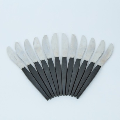 A Set of 12 Mid-Century Black Handled Knives
