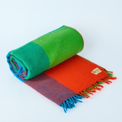 An Onehunga Woollen Mills 'Rainbow Tiki' Picnic Rug