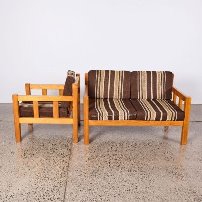 A Retro Upholstered and Wood Two Seater Sofa and Armchair