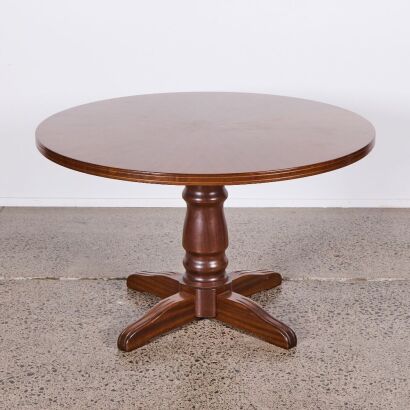 An Oak Table with A Pedestal Base