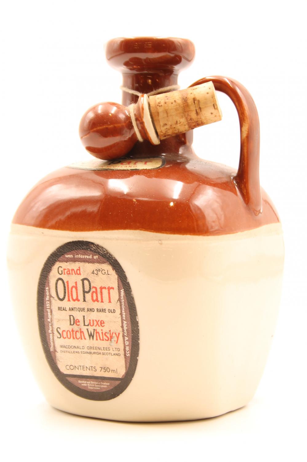 1) Grand Old Parr De Luxe Scotch Whisky in ceramic jug, Circa 60s