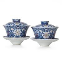 A Pair of Chinese Qing Dynasty Blue-Enameled 'Longevity' Lidded Bowls and Saucers (Qianlong Nian Zhi Mark)