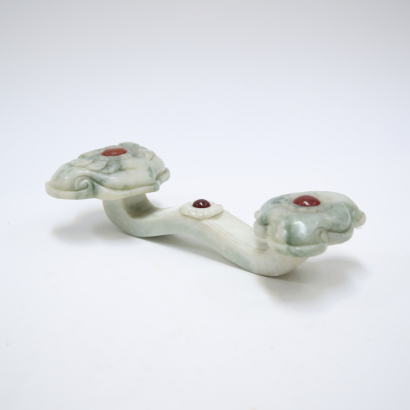 A Chinese jade-carved ruyi sceptre