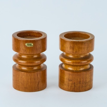 A Pair of Teak Candle Sticks