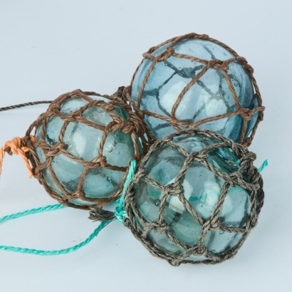 A Trio of Japanese Glass Fishing Floats