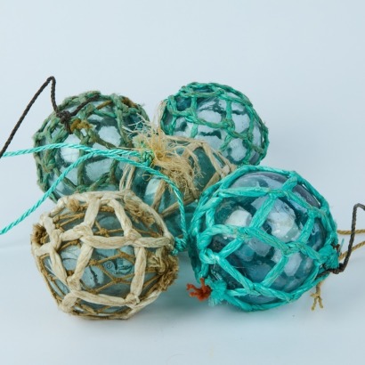 A Set of Five Japanese Glass Fishing Floats
