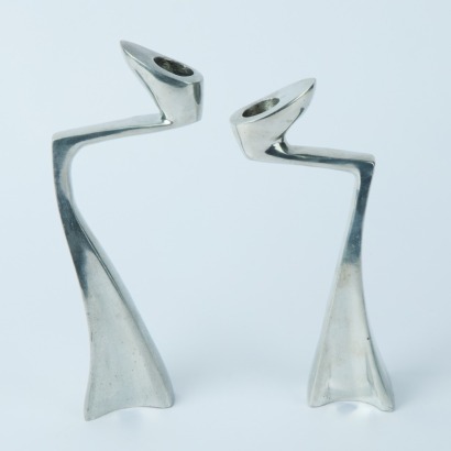 A Pair of Swan Form Polished Aluminium Candlesticks in the Style of Matthew Hilton